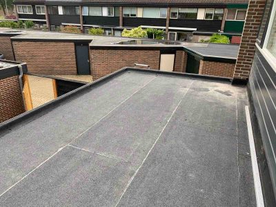 Plat dak garage vernieuwen